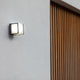 LED Außenwandlampe Telin IP54 Anthrazit an einer Außenwand montiert.