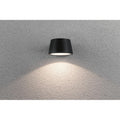 LED Außen Wandleuchte Capea Anthrazit IP44 an einer Wand montiert mit sanftem Lichteffekt