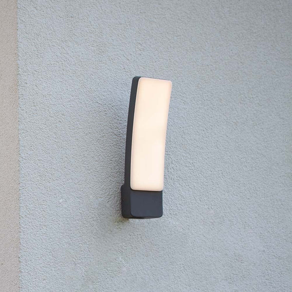 LED-Kira anthracite outdoor wall light IP54 installed on a wall, stylish and modern design.