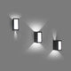 LED Außenwandleuchte LOG 3000K IP54 Dunkelgrau in modernem Design, drei Modelle an der Wand montiert.