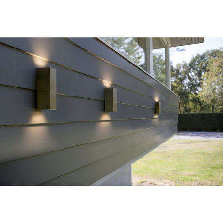 LED Luca outdoor wall light IP44 stainless steel mounted on a wall, ideal for outdoor lighting.