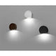 LED Außenwandleuchte PILL 3000K IP54 Weiß in verschiedenen Farben an einer Wand montiert.
