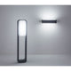 LED Außenwandleuchte STICKER IP65 Dunkelgrau an Wand und Boden, moderne Lichtlösungen für Außenbereiche.