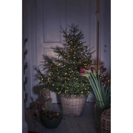 LED Baummantel mit Ring Ø 11 mit Globes 5 Stränge mit 40 Dioden 200 bernsteinfarbene Dioden am Weihnachtsbaum im Korb.