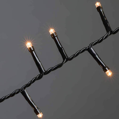 LED Cluster string lights Black with glowing lights on a black cable.