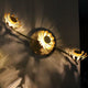 LED Deckenleuchte Bloom 3-flammig 50cm Goldfarben mit warmweißem Licht und kelchartigen Reflektoren.
