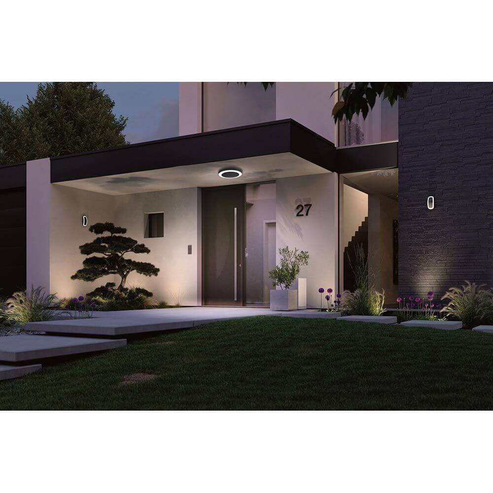 Circula LED Außen Deckenleuchte mit Sensor Schwarz in modernem Eingangsbereich bei Nacht.