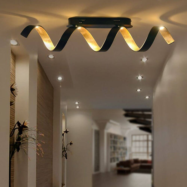 LED Ceiling light Helix gold-coloured, black in a modern room design