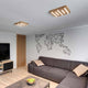 LED Deckenleuchte Neele 1820lm Eiche-Geölt in modernem Wohnraum mit geometrischem Wanddesign.