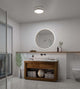 LED Deckenleuchte Noxy IP44 in modernem Badezimmer mit Spiegel und Holzwaschtisch.