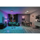 LED Deckenleuchte Rainbow RGB Schwarz Ø 47,5cm im modernen Wohnraum mit bunten Lichteffekten.