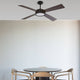 LED Deckenventilator Hydra Ø 132cm in modernem Design über einem Esstisch.