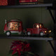 LED Dekoleuchte Pick-up mit Weihnachtsmann batteriebetrieben Rot auf Regal, leuchtende Weihnachtsdeko mit Anhänger und Weihnachtsmann im Fahrerhaus