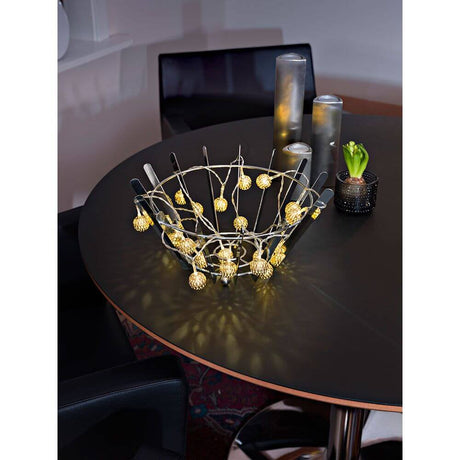 LED Decorative light chain with small gold-coloured metal balls, 20 warm white LEDs, battery-powered, on table decoration.