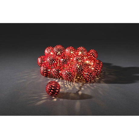 LED Decorative string light red metal balls 24 warm white diodes glow in the dark and give every room a festive flair.