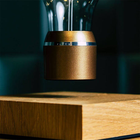 LED-decorative table lamp floating light bulb with golden socket and oak wood base