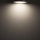 LED Einbaupanel Ø 15cm flach rund silber Dimmbar 9W Neutralweiß strahlt Licht auf eine Wand.