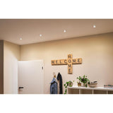 LED Einbauleuchten Gil Set in modernem Raum, strahlend hell mit 'WELCOME HOME'-Dekoration.