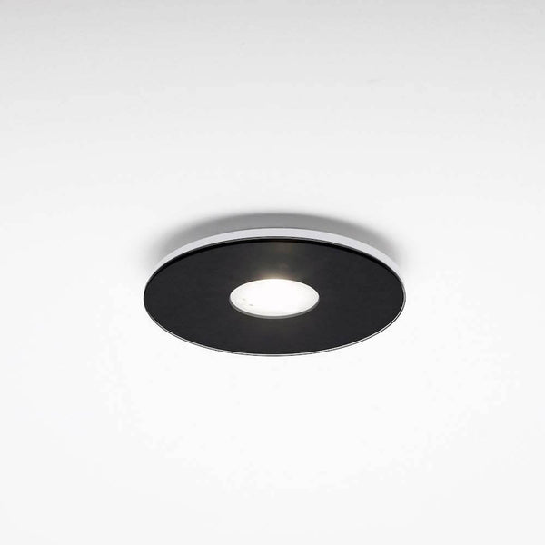 LED-Luminaire encastrée Tet sans lentille au design rond moderne avec cadre extérieur noir et source lumineuse intérieure.