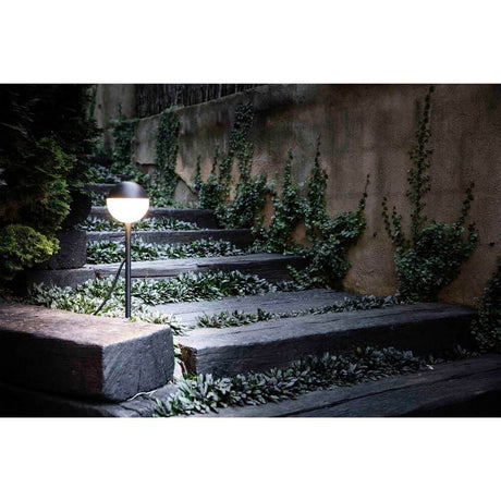 LED Path light with ground spike PICCOLA 2700K IP65 black on a staircase in the garden