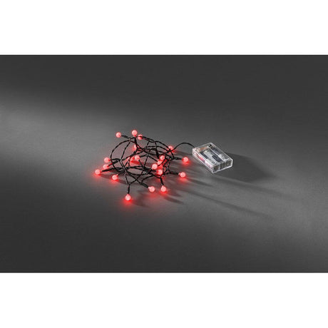 LED globelyskjede med runde dioder, timer, 20 røde dioder, batteridrevet på svart bakgrunn.