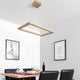LED Hängelampe Legno 6160lm Eiche-Geölt in modernem Esszimmer mit Holzdecke und Kunstwerken.
