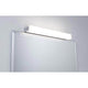LED HomeSpa Spiegelleuchte Luno CCT-Switch Weiß über einem Badezimmermirror.