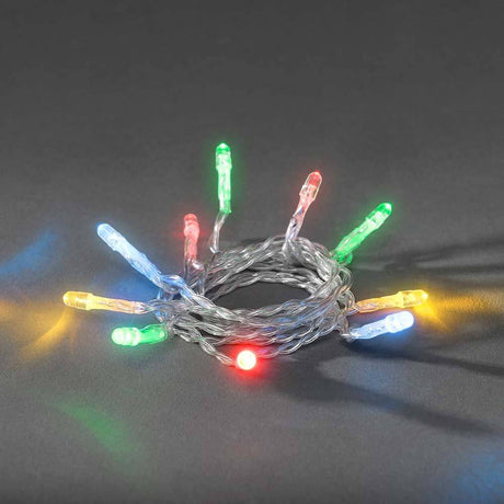 LED Lichterkette Timer 10 bunte Dioden batteriebetrieben auf dunklem Hintergrund.