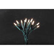 LED guirlande lumineuse mini 100 diodes blanc chaud avec des lumières festives sur fond noir.