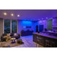 LED Modul Smart Home Zigbee RGBW CCT beleuchtet modernes Wohnzimmer mit farbigen LEDs.
