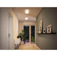 LED Panel Atria Shine Wärme-Dimmbar Weiß in modernem Flur mit warmweißer Beleuchtung.