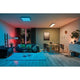 LED Panel Smart Home Zigbee Amaris Eckig RGBW Weiß-Matt in modernem Wohnzimmer mit stimmungsvollem Licht.