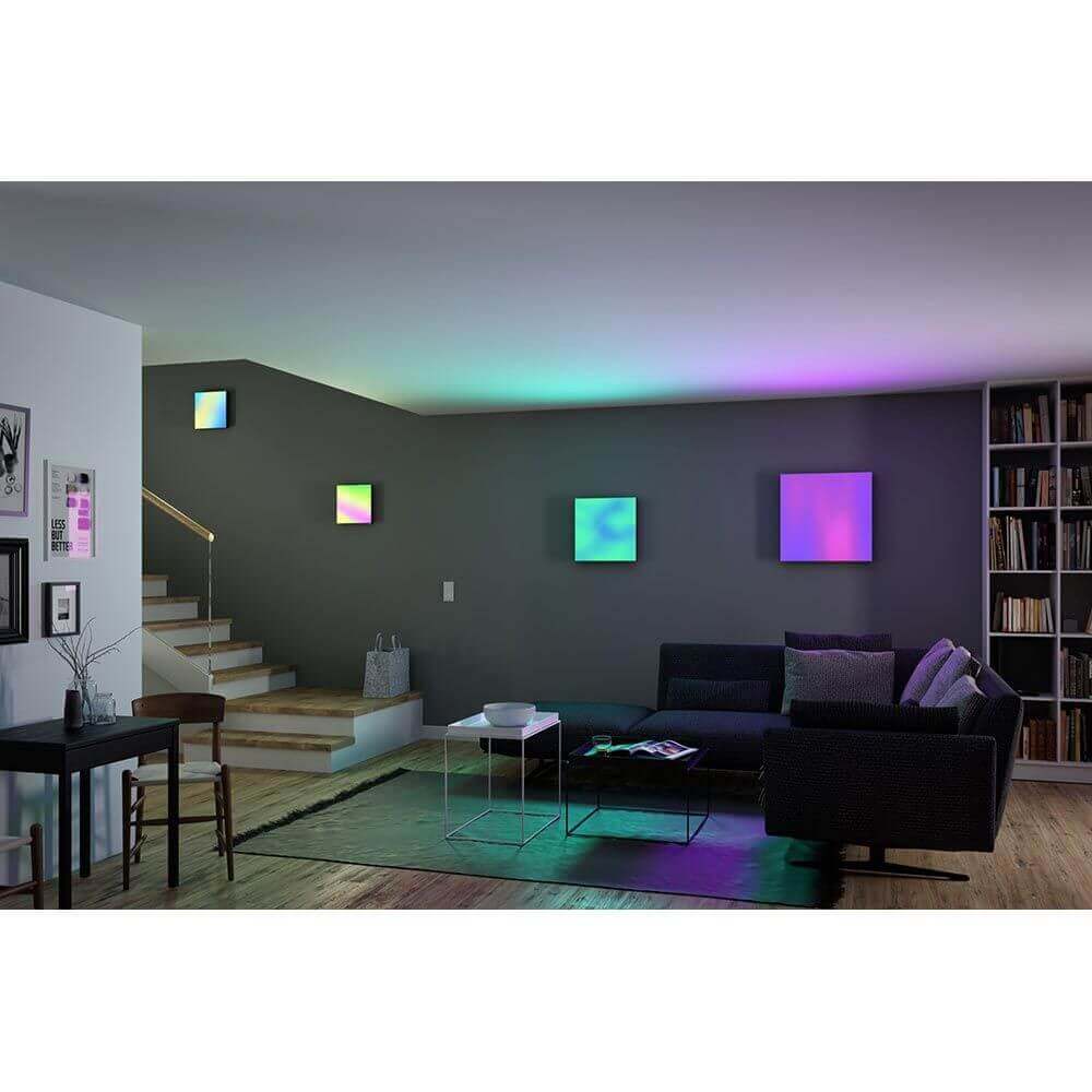 Modernes Wohnzimmer mit LED Panel Velora Rainbow, das farbenfrohe Lichteffekte erzeugt und gemütliche Atmosphäre schafft.