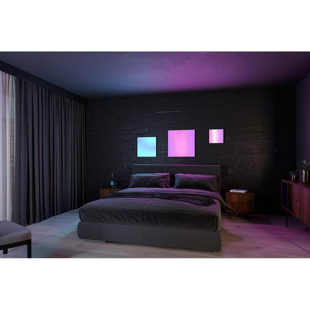Beleuchtetes Schlafzimmer mit LED Panel Velora Rainbow in dynamischen Farben.