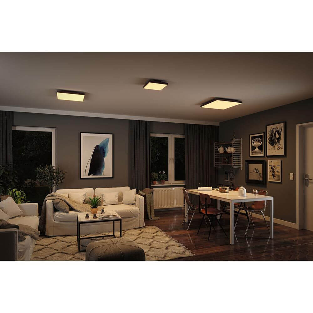 LED Panel Velora Rainbow RGBW Dynamisch Schwarz im Wohnraum mit spektakulären Lichteffekten und modernem Design.