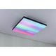 LED Panel Velora Rainbow RGBW Dynamisch Quadratisch Schwarz zeigt spektakuläre Lichteffekte in einem modernen Raum.
