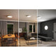 LED Aufbaupanel Velora Dim-to Warm CCT in modernem Wohnraum, an Decke und Wand montiert.