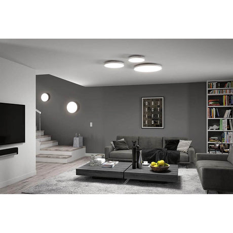 LED Panel Velora 60cm Wärme-Dimmbar Weiß in modernem Wohnzimmer mit einfacher Montage.