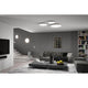 LED Panel Velora Dim-to-Warm Weiß in modernem Wohnraum mit Deckenmontage und stilvollem Interieur.