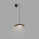 LED Pendelleuchte SLIM Schwarz, Goldfarben in modernen Innenräumen.