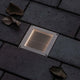 LED Solar Bodeneinbauleuchte Aron auf Pflastersteinen, mit Bewegungsmelder und warmweißem Licht, IP67.
