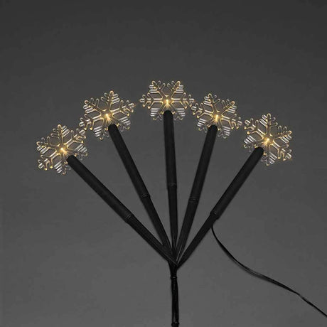 LED Spike light with 5 clear snowflakes for festive decoration and atmospheric lighting.