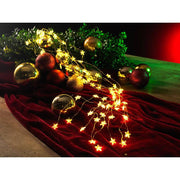 LED Sternenlametta 10 Stränge mit 20 Dioden 200 Warmweiße Dioden goldfarbener Draht auf einem Tisch mit Weihnachtsdekoration.