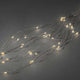 LED Tropfenlametta 10 Stränge mit 20 Dioden 200 bernsteinfarbene Dioden auf silberfarbenen Drähten.