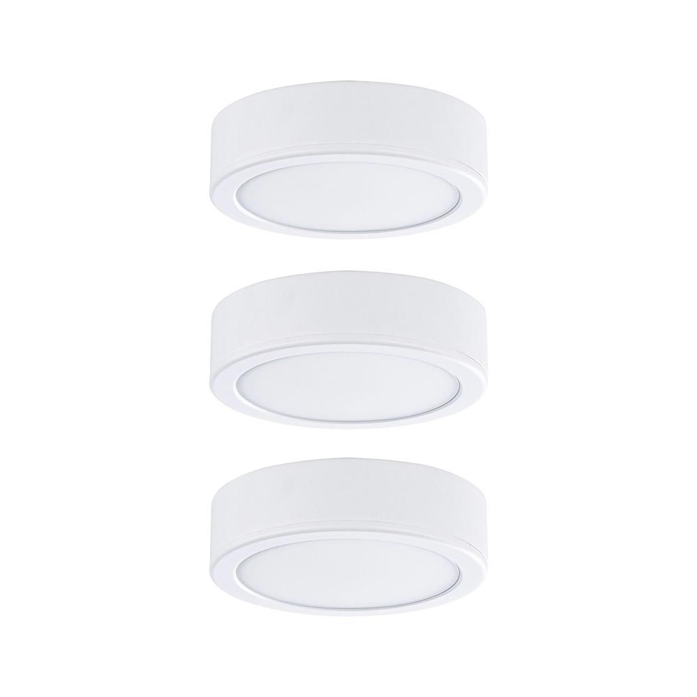 Drei weiße LED Unterschrankleuchten Pukk Rund 6,5cm im Set für effektvolle Beleuchtung unter Möbeln.