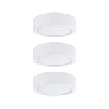 Drei weiße LED Unterschrankleuchten Pukk Rund 6,5cm im Set für effektvolle Beleuchtung unter Möbeln.