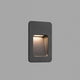 LED Wand-Einbauleuchte NASE-2 3000K IP44 Dunkelgrau an einer Wand montiert, modernes Design, warmes Licht.