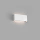 LED Wandlampe NASH 8W Weiß an einer grauen Wand installiert, modern und stilvoll.