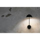 LED Lese-Wandlampe PURE 6W 3000K Schwarz an einer Wand, elegante Beleuchtung für jeden Raum.