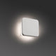 LED Wandleuchte ELSA 5,5W 2700K Weiß an einer Wand montiert, modernes Design in Weiß.